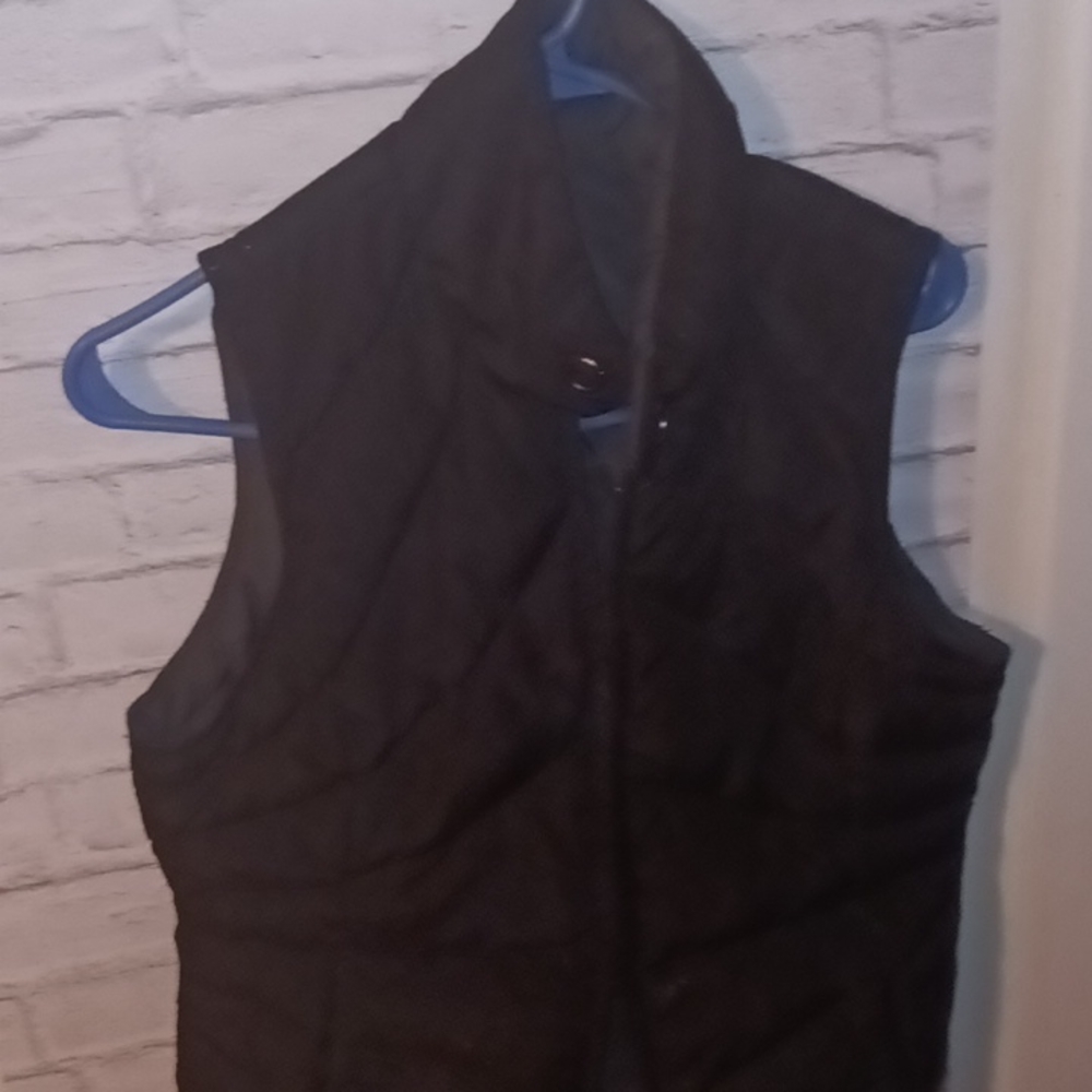 Black puffy vest